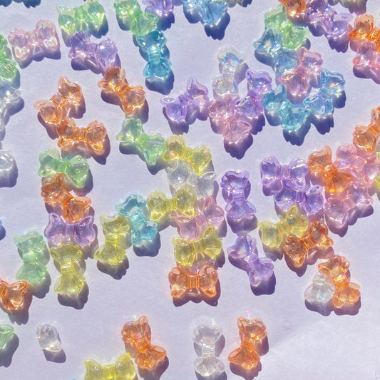 50pc iridescent mini bow beads