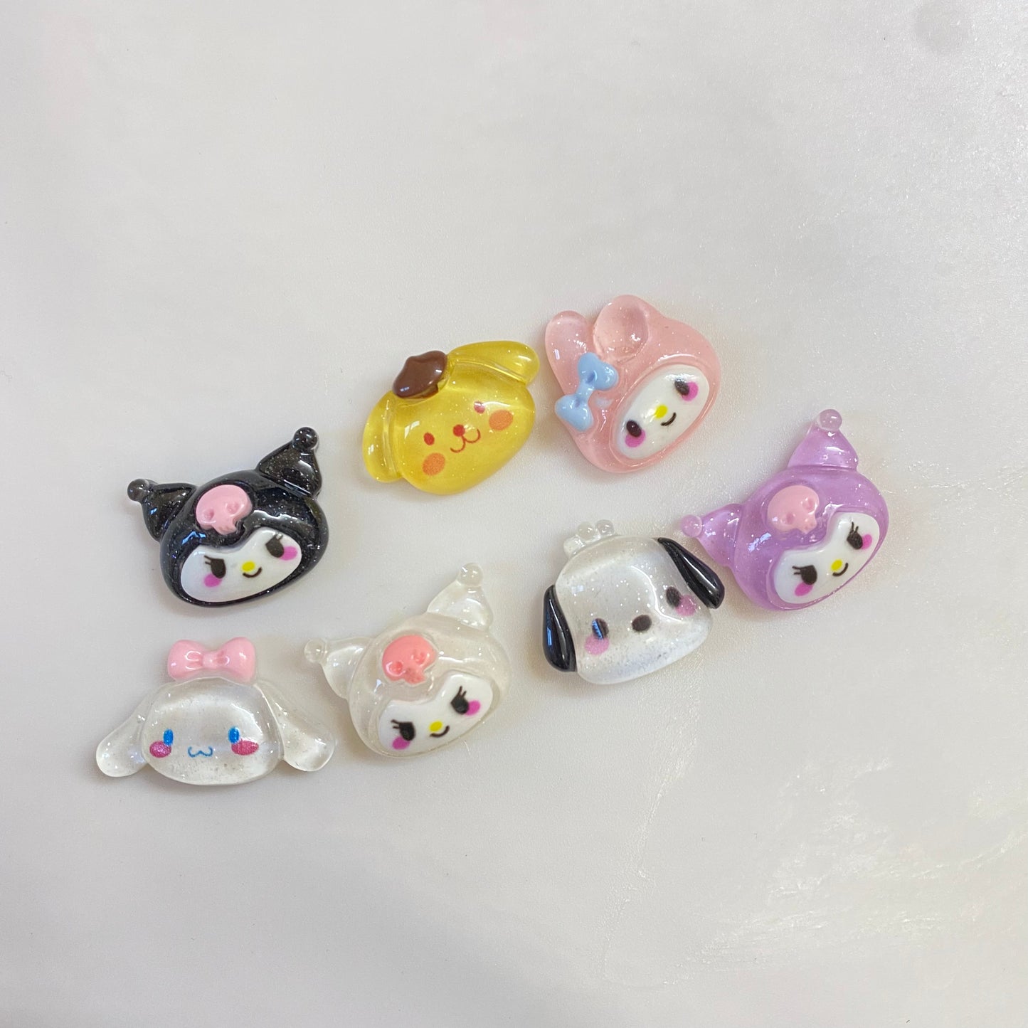 Cartoon heads glossy charms  set of 7